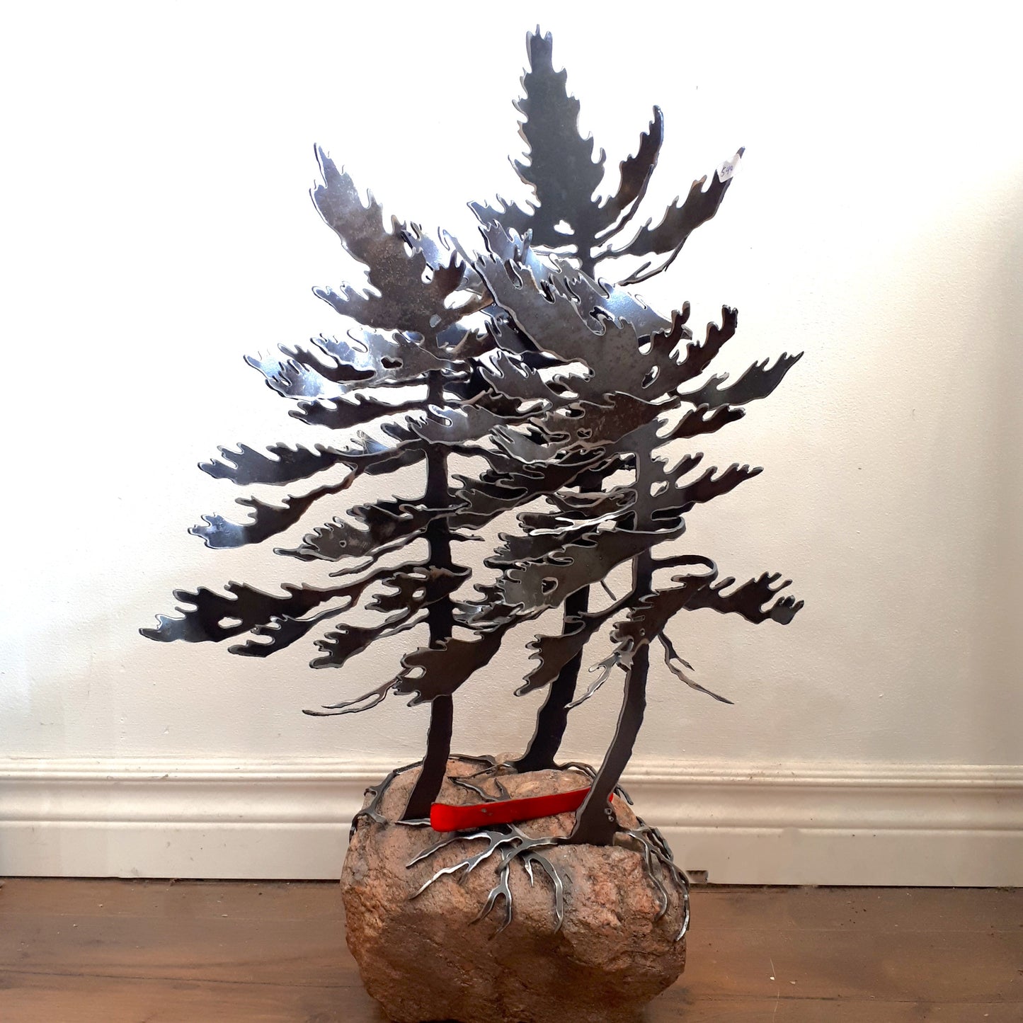 Steel Triple-Tree Sculpture with Red Canoe (540) on Canadian Rock