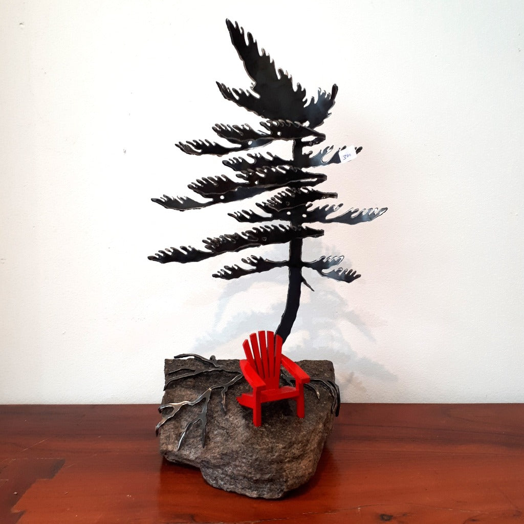 Steel Tree Sculpture with Muskoka Chair (300) on Canadian Rock