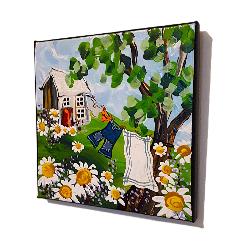 Painting of a house with a clothesline surrounded by flowers and trees