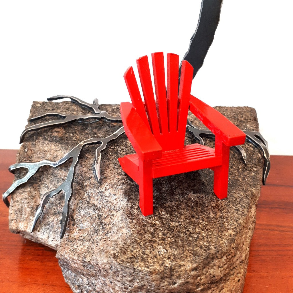 Steel Tree Sculpture with Muskoka Chair (300) on Canadian Rock