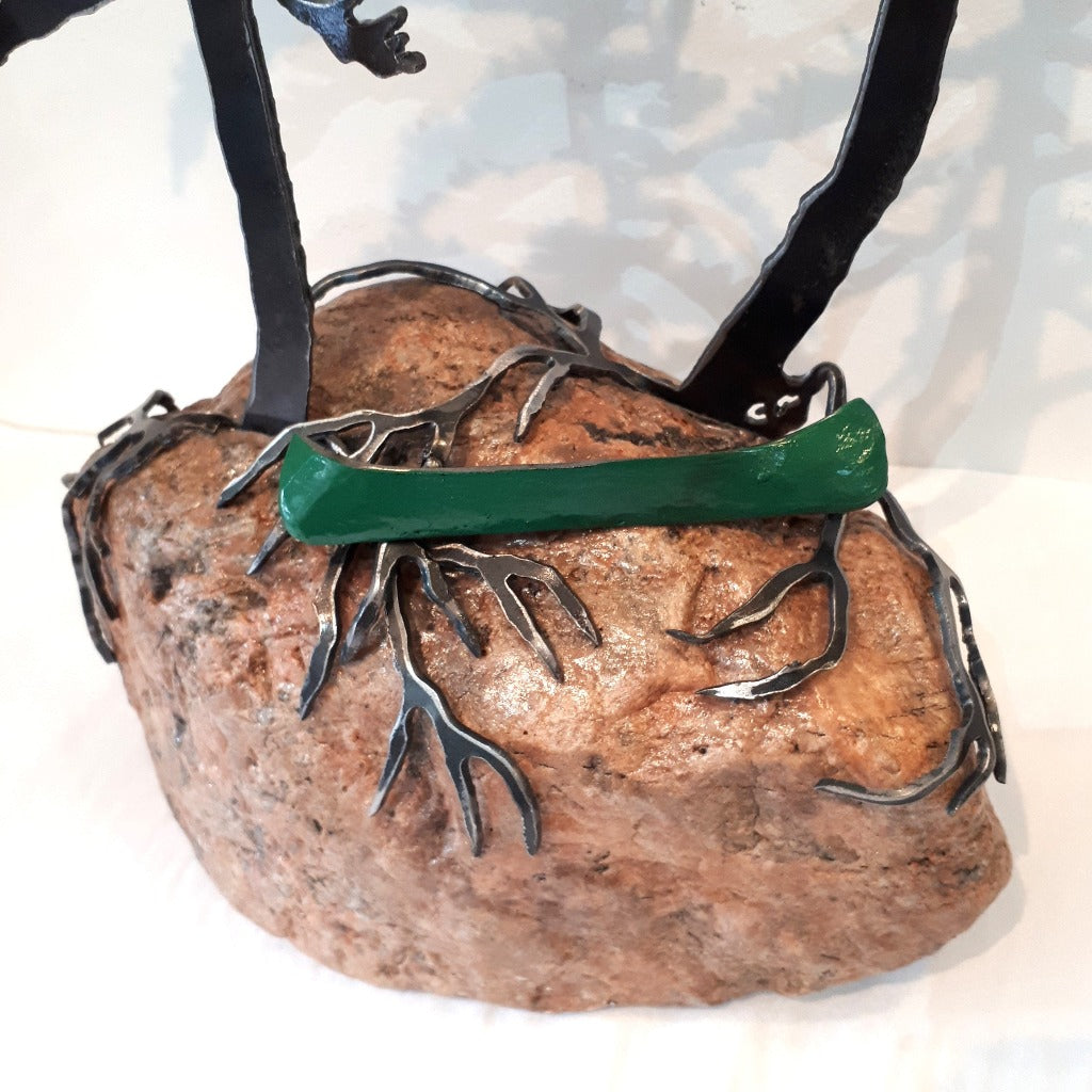 Steel Tree Sculpture with Green Canoe (420) on Canadian Rock