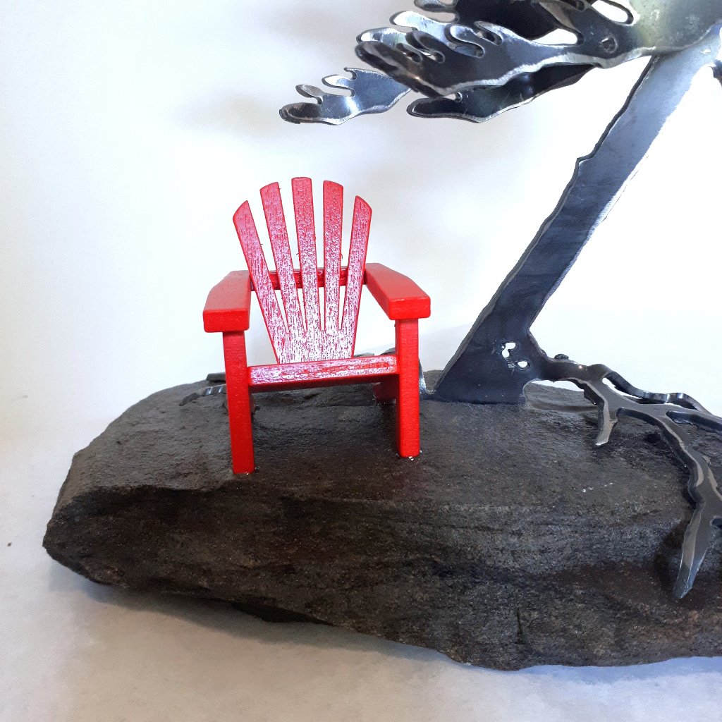 Steel Tree Sculpture with Red Adirondack/Muskoka Chair on Canadian Rock