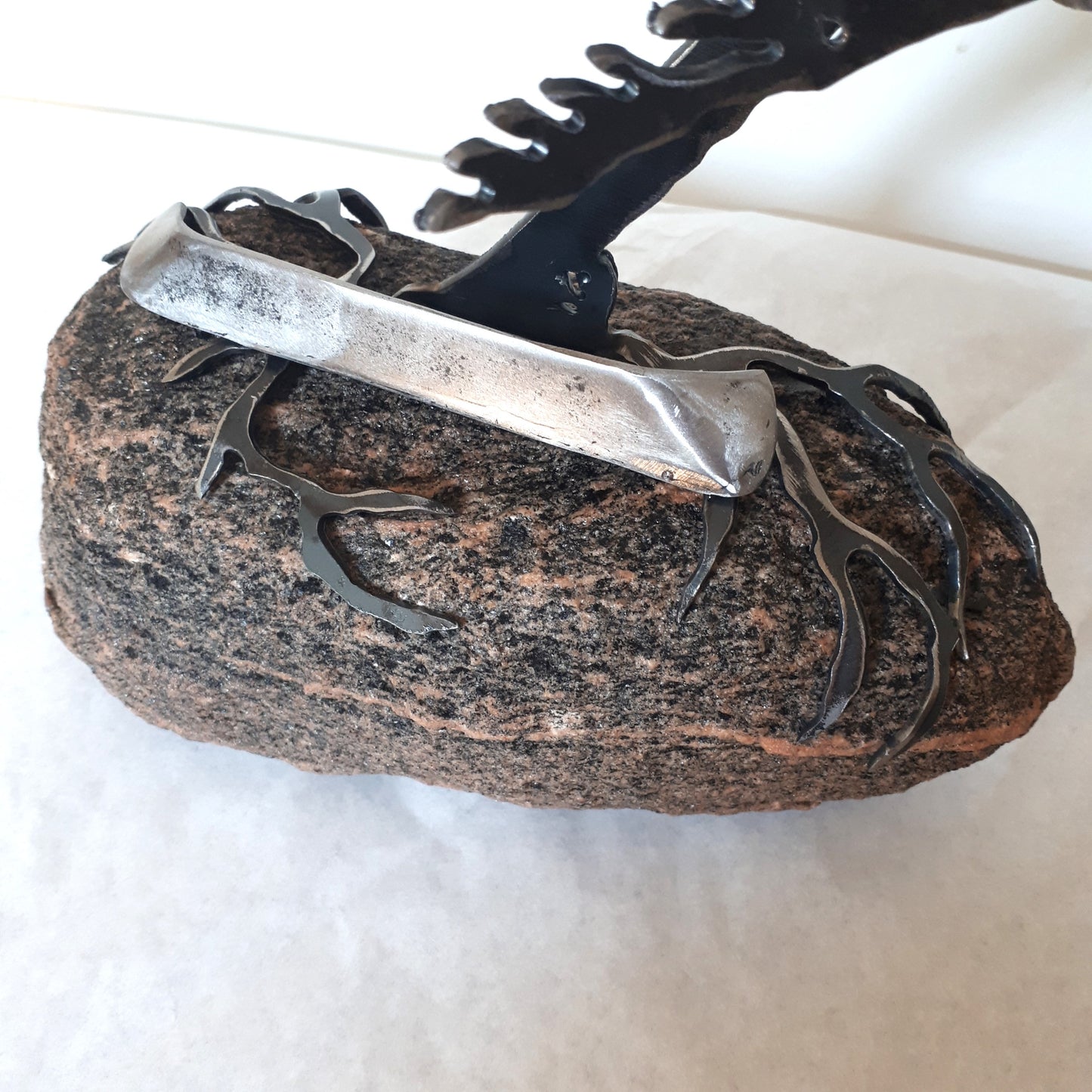 Steel Tree Sculpture on Canadian Rock with Steel Canoe